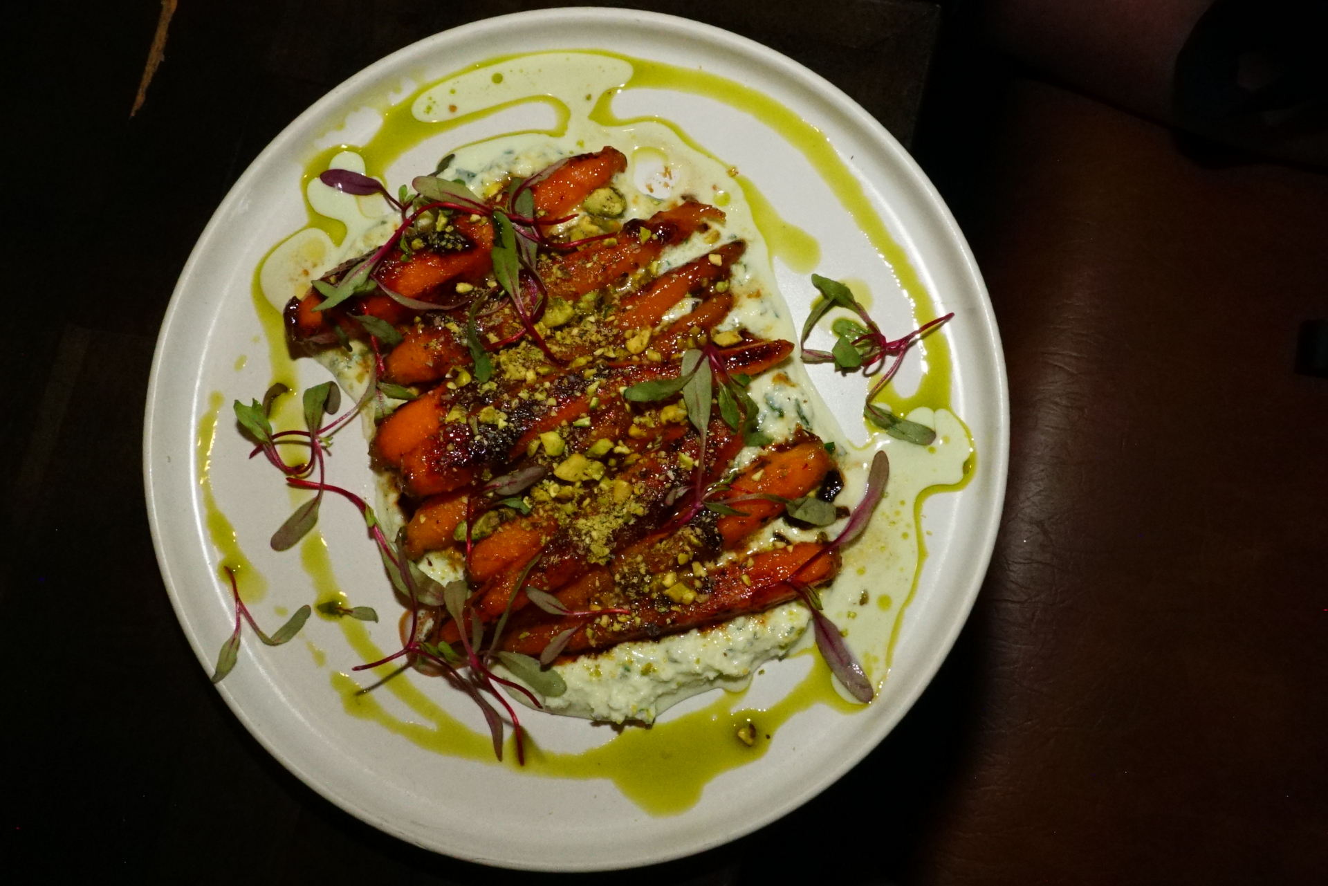 Honey-glazed heirloom carrots with herb oil — Cajun restaurant near me