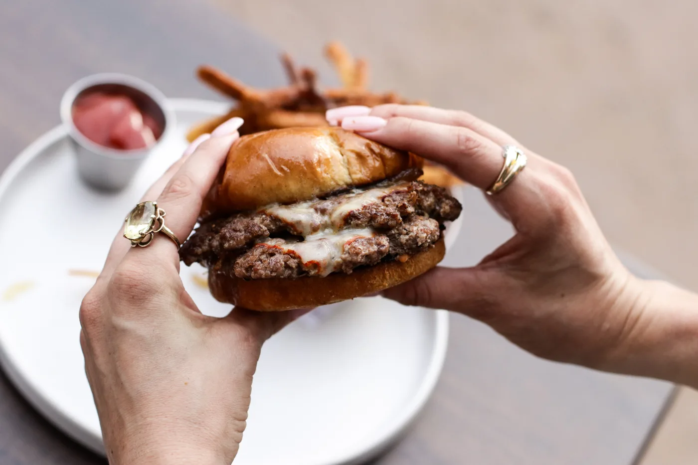Smash burger with melted cheese on a brioche bun